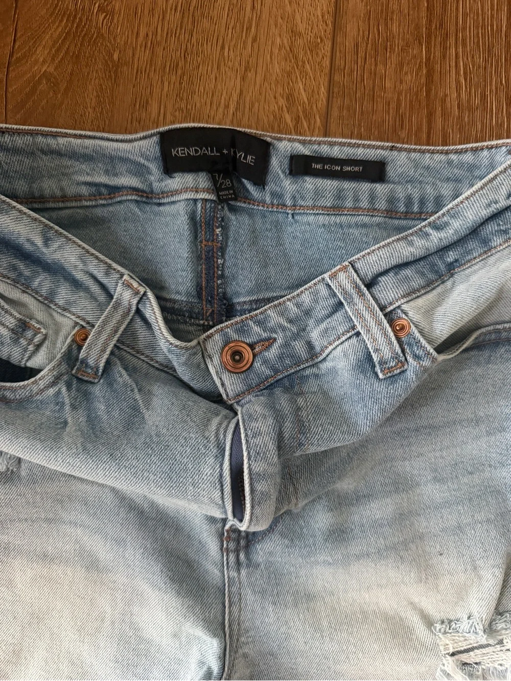 light wash distressed denim shorts